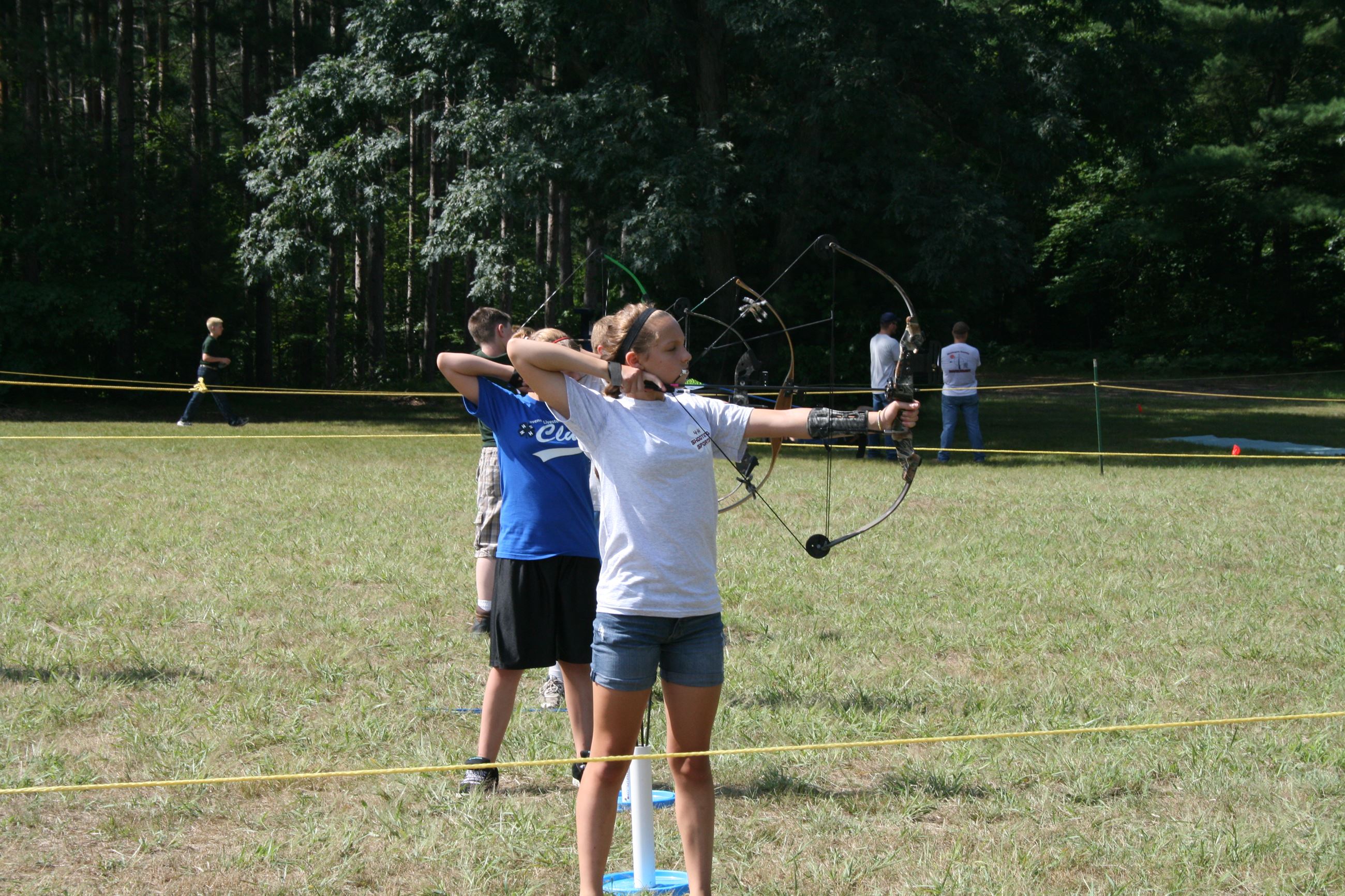 Youth participating in archery competition